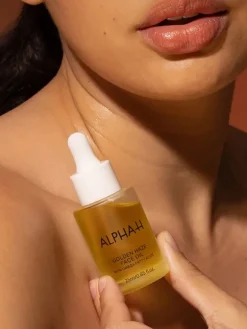 Alpha-H Golden Haze Face Oil | MECCA